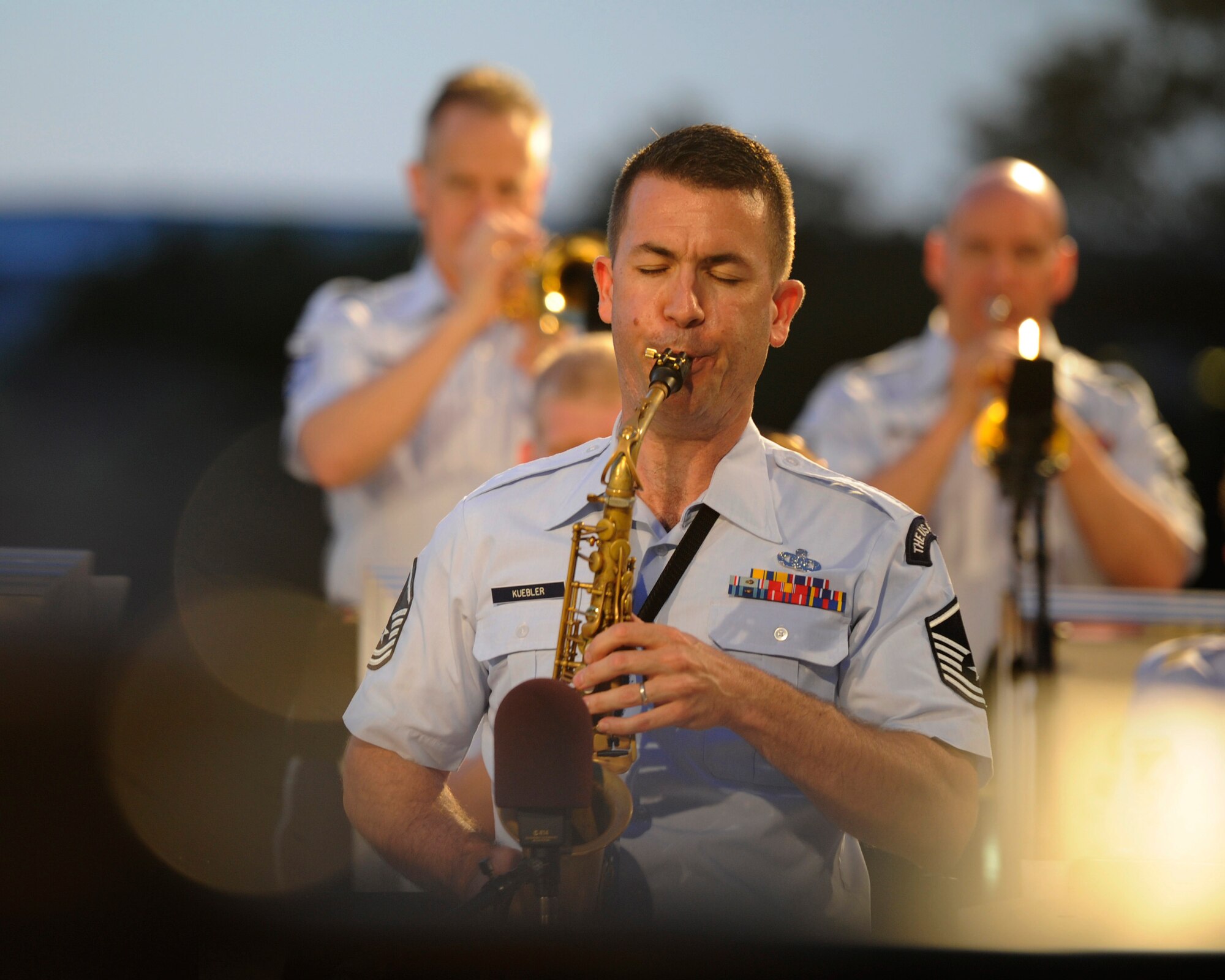Master Sgt. Tyler Kuebler performs on the west side steps of The U.S. Capitol Building, Washington, D.C., June 10, 2014. The Air Force String together with The Airmen of Note came together for the D-Day 70th Anniversary Big Band Salute. Kuebler is the lead alto saxophonist for The Airmen of Note. (U.S. Air Force photo/Senior Airman Nesha Humes)