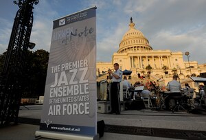 The Air Force Strings with The Airmen of Note present a D-Day 70th Anniversary Big Band Salute on the steps of The U.S. Capitol Building, Washington, D.C., June 10, 2014. The Air Force Strings and Airman of Note, both groups members of The U.S. Air Force Band, will be performing free outdoor concerts at the capitol steps every Tuesday evening throughout the summer. (U.S. Air Force photo/Senior Airman Nesha Humes)