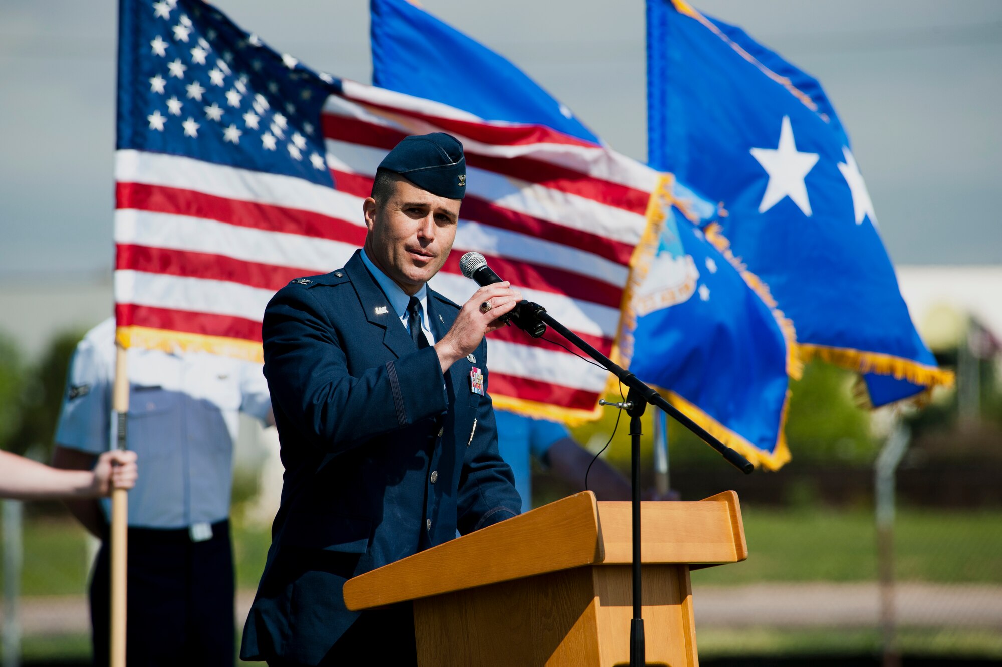 Col. John Wagner, 460th Space Wing commander, gives his final remarks at the conclusion of the 460th SW Change of Command Ceremony June 12, 2014, at the all-purpose field on Buckley Air Force Base, Colo. Wagner became the commander of the 460th SW after service for two years as the 614th Air and Space Operations Center Commander and Joint Space Operations Center director in Vandenberg AFB, Calif. (U.S. Air Force photo by Senior Airman Phillip Houk/Released)