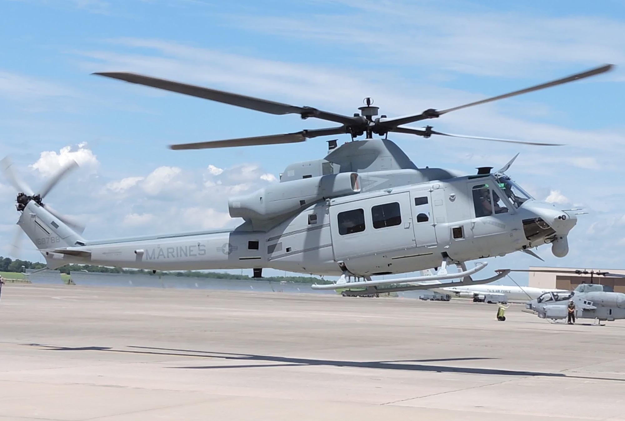 The Marine Corps’ newest utility helicopter prepares to land Wednesday on the Robins flightline. It’s the first of four set to be stationed here. (U.S. Air Force photo by Roland Leach)