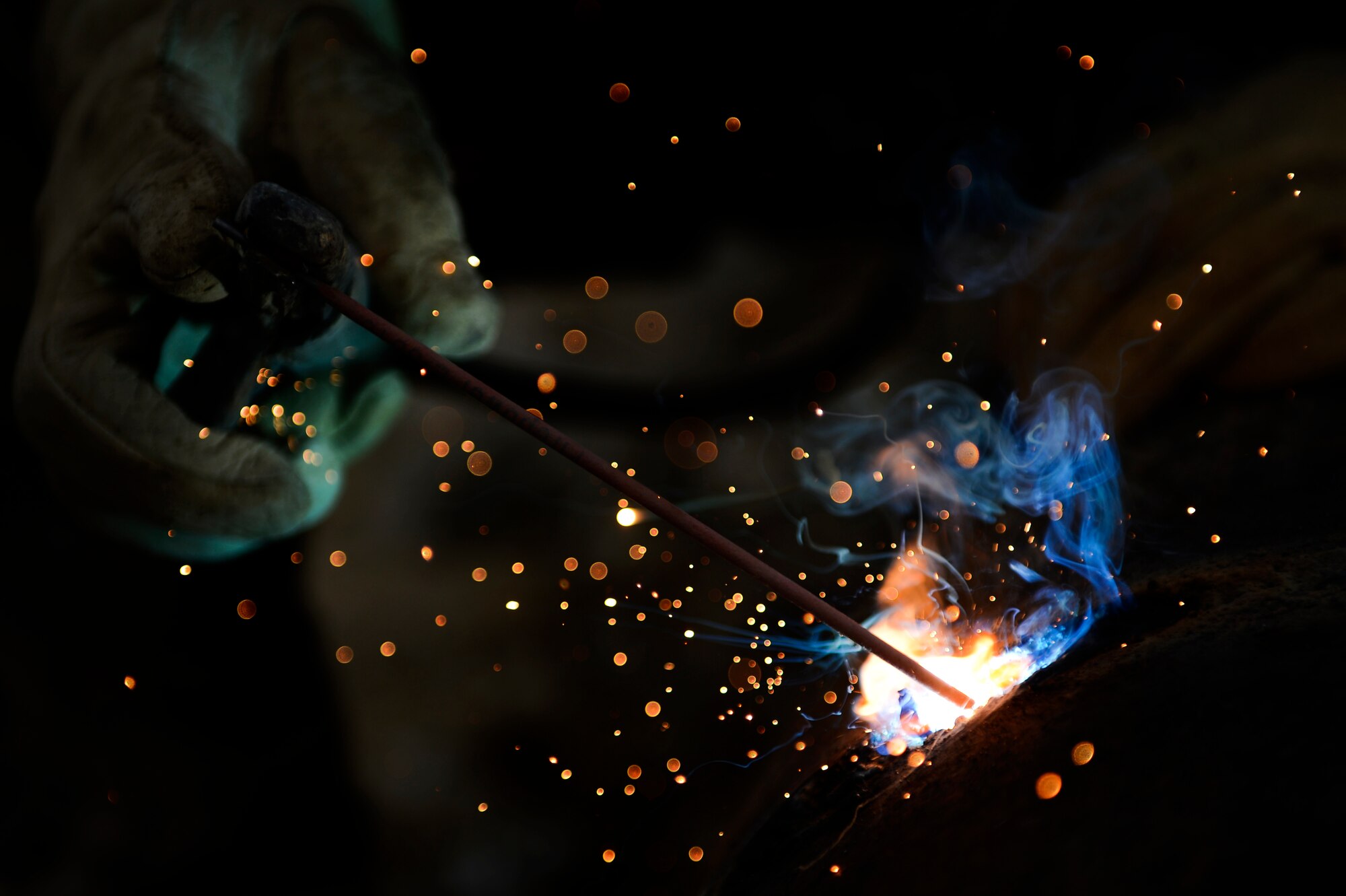 U.S. Air Force Staff Sgt. William Thomas, 577th Expeditionary Prime Base Engineer Emergency Force Squadron troop construction bravo, welds a drainage pipe together at Bagram Air Field, Afghanistan, May 17, 2014. The drainage pipe will assist in keeping the helicopter landing zone free of water. Thomas, a Cincinnati, Ohio native is deployed from the 786th Civil Engineer Squadron Ramstein Air Base, Germany. (U.S. Air Force photo by Senior Airman Sandra Welch) 