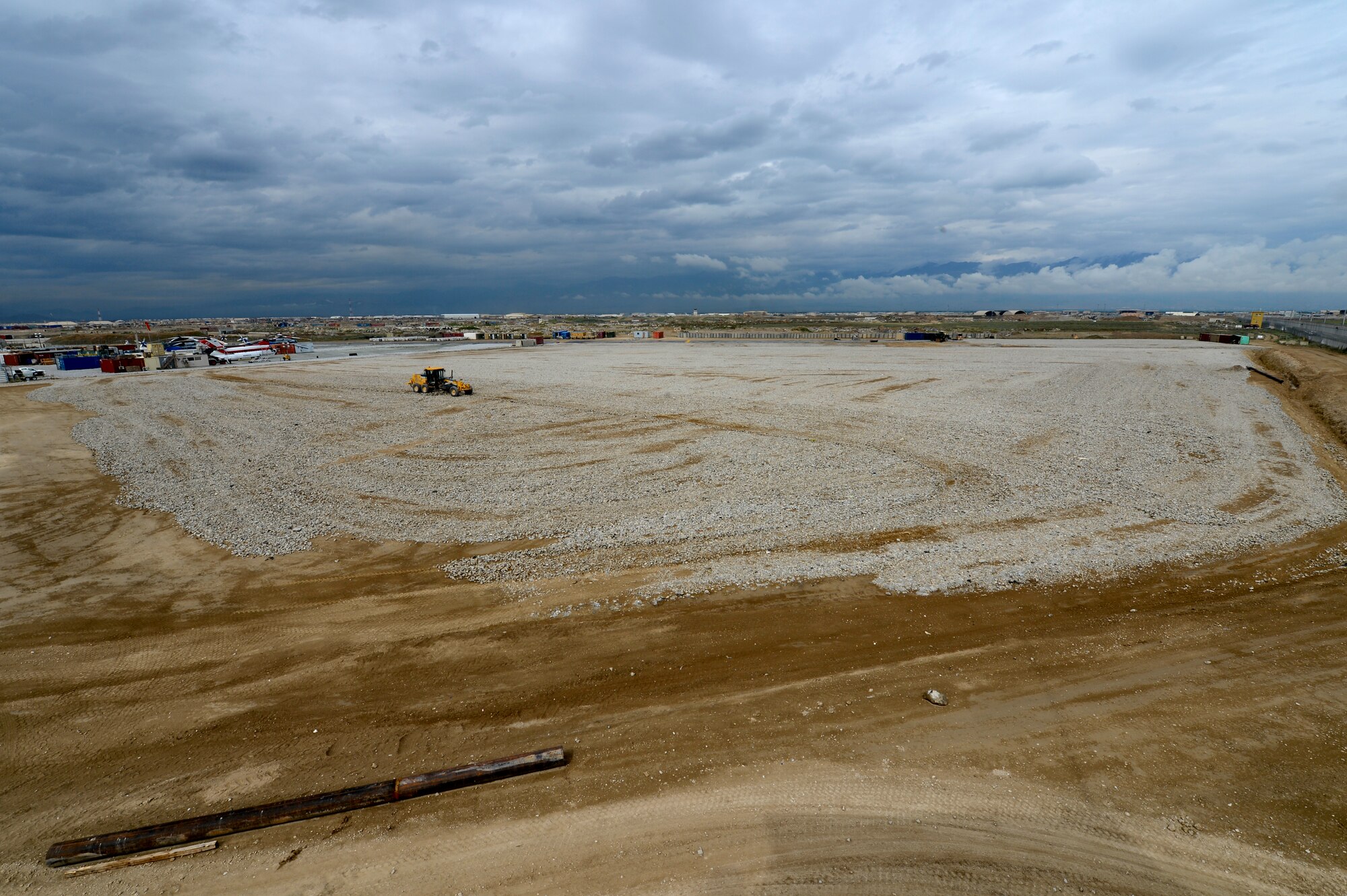 U.S. Air Force 577th Expeditionary Prime Base Engineer Emergency Force Squadron work on the Hickory Landing Zone at Bagram Air Field, Afghanistan, May 17, 2014. The 15-man team is creating the  landing zone with a dranage system and providing numerious helicopter parking spots. (U.S. Air Force photo by Senior Airman Sandra Welch/ Reviewed)