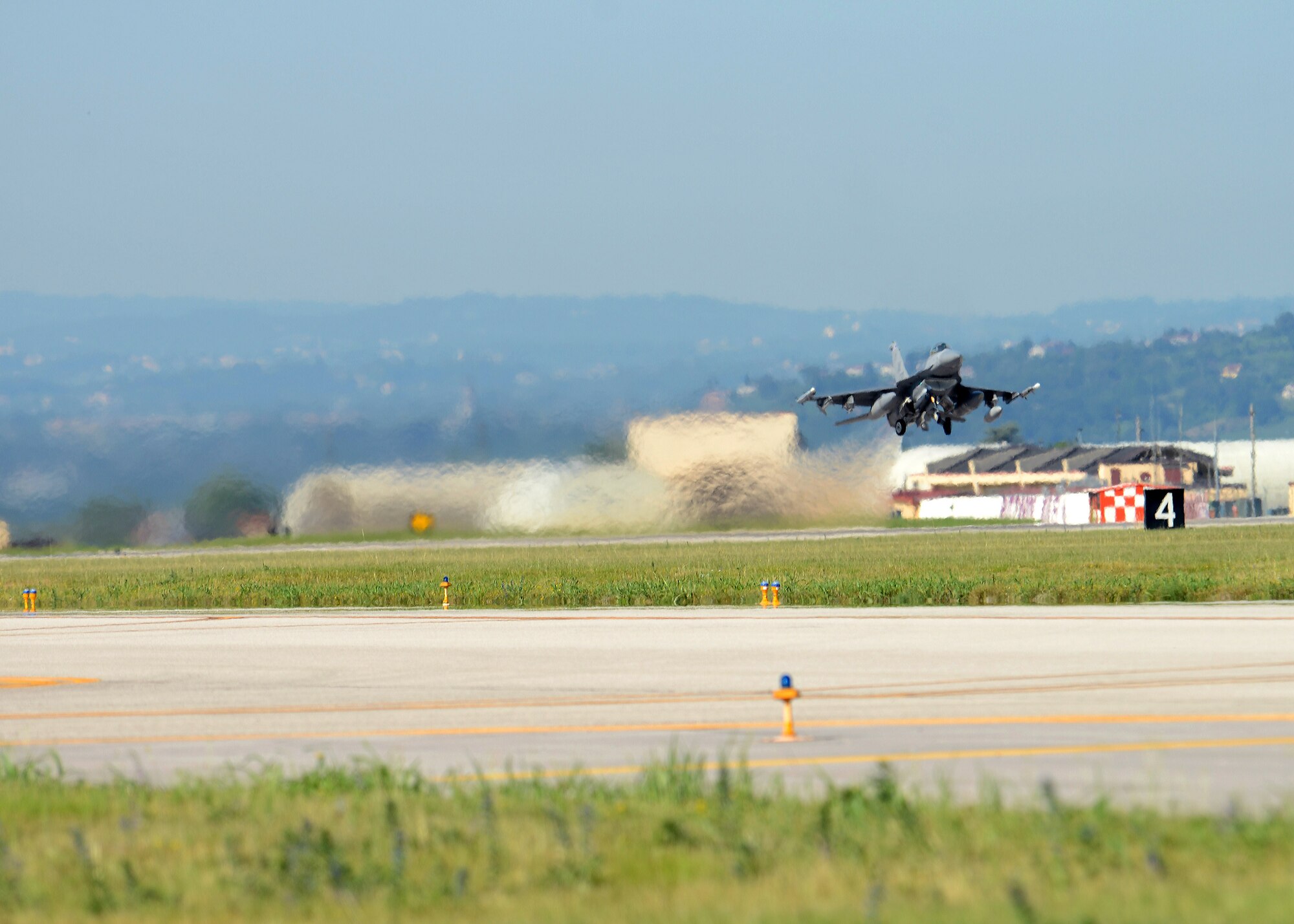 An F-16 Fighting Falcon assigned to the 510th Fighter Squadron, takes off from Aviano Air Base, Italy, for Nellis Air Force Base, Nev., to participate in exercise Red Flag, June 13, 2014. This will be the first time the squadron has participated in Red Flag since 2006. (U.S Air Force photo/Airman 1st Class Deana Heitzman)