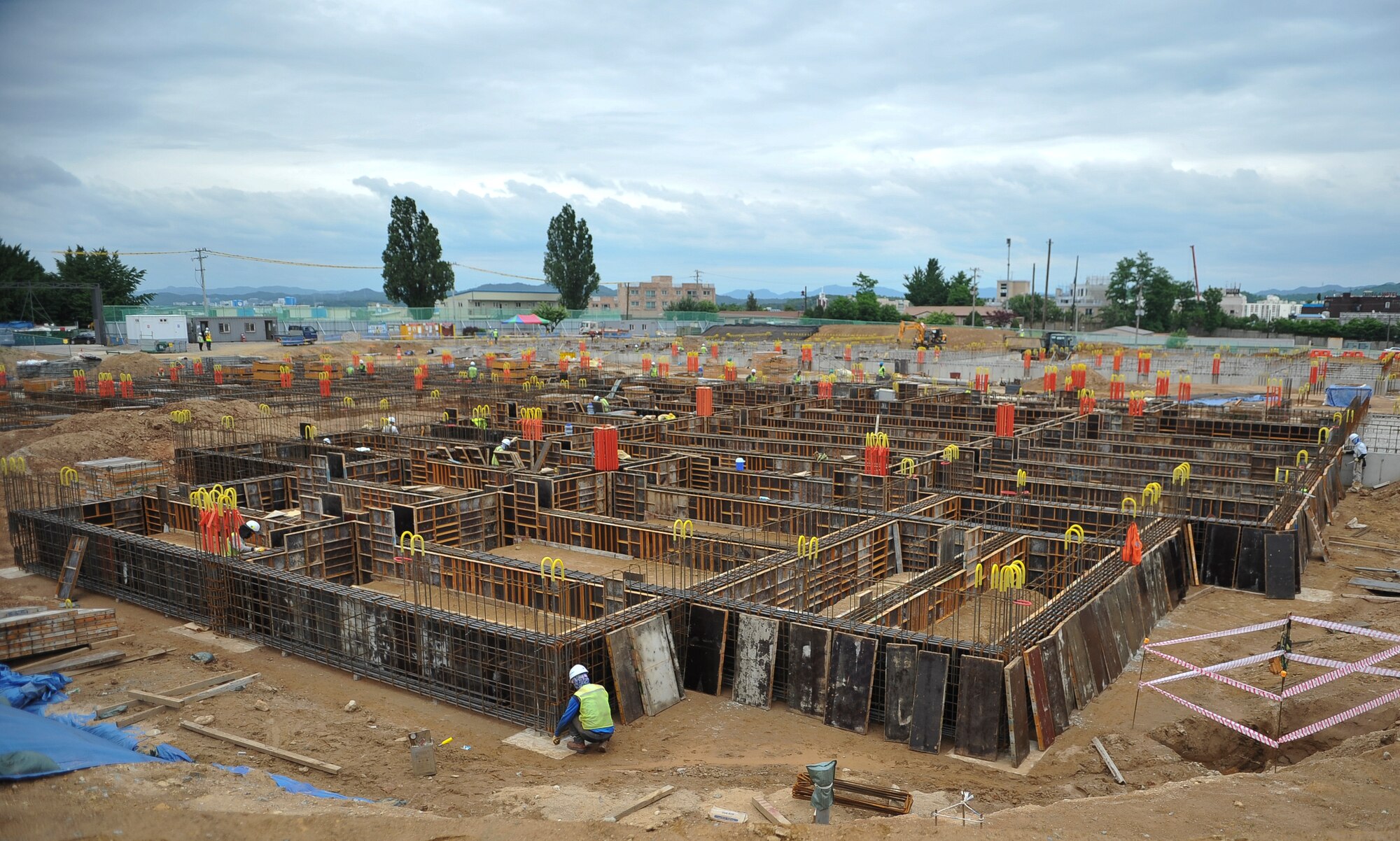 A new elementary school takes shape on Osan Air Base, Republic of Korea, June 5, 2014. The structure will house students in kindergarten through fifth grade. (U.S. Air Force photo/Airman 1st Class Ashley J. Thum)
