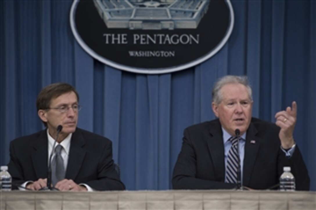 Frank Kendall, right, undersecretary of defense for acquisition, technology and logistics, and Sean Stackley, the Navy's assistant secretary for research, development and acquisition, brief reporters at the Pentagon June 13, 2014.