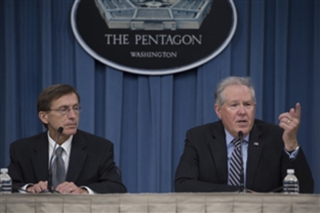 Frank Kendall, right, undersecretary of defense for acquisition, technology and logistics, and Sean Stackley, the Navy's assistant secretary for research, development and acquisition, brief reporters at the Pentagon June 13, 2014.  