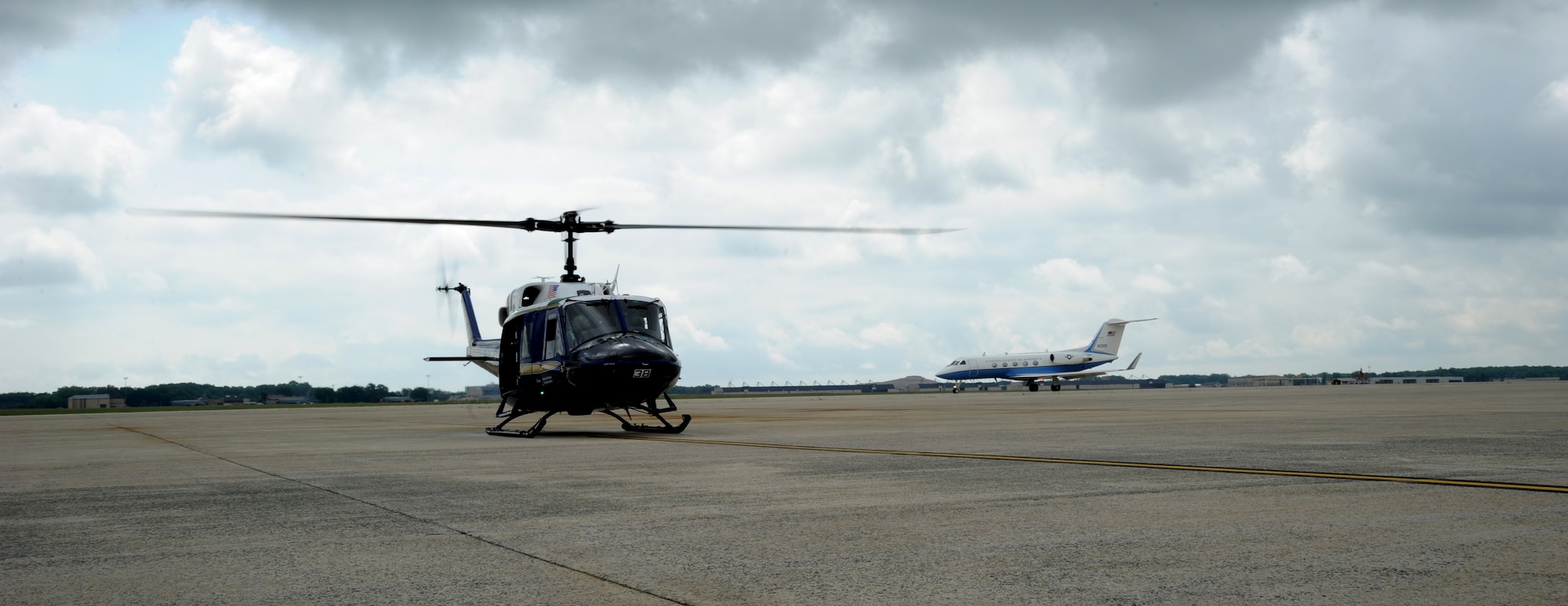 Air Force District of Washington Commander Maj. Gen. Sharon K. G. Dunbar, Lt. Col. Bill Sullivan and crew prepare to take-off on a UH-1N Huey for the general’s fini-flight at Joint Base Andrews, Md., June 13, 2014. Dunbar will retire from the Air Force after 32 years of service next month. Sullivan is a 1st Helicopter Squadron pilot. (U.S. Air Force photo/Master Sgt. Tammie Moore)