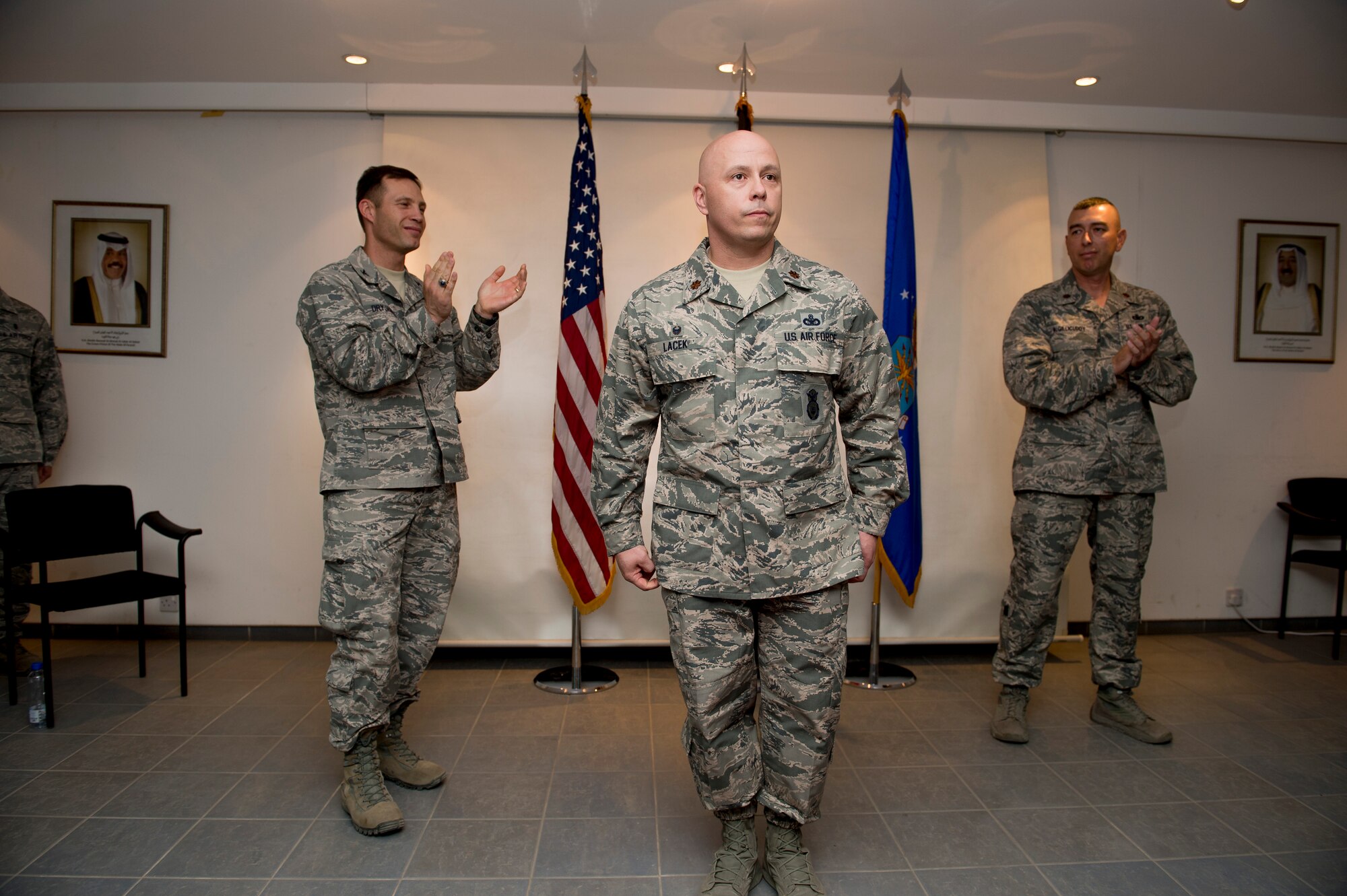 U.S. Air Force Maj. Christopher Lacek stands before his Airmen after assuming command of the 387th Expeditionary Security Forces Squadron June 12, 2014 at an undisclosed location in Southwest Asia. Lacek comes from McConnell Air Force Base, Kansas where he was the commander of the 22nd Security Forces Squadron. (U.S. Air Force photo by Staff Sgt. Jeremy Bowcock)