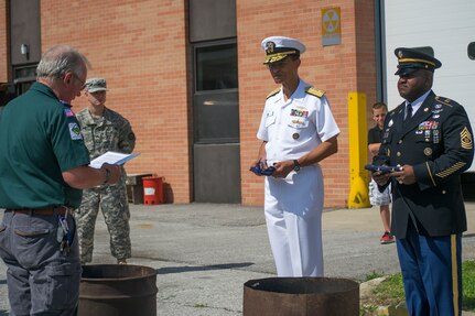 OMAHA, Neb. (June 14, 2014) Commander, U.S. Strategic Command (USSTRATCOM) Adm. Cecil D. Haney and USSTRATCOM senior enlisted leader Cmd. Sgt. Maj. Patrick Z. Alston, right, prepare to retire an American flag at the Boy Scouts of America Flag Day Breakfast. The breakfast honored active duty and veteran military personnel and commemorated the Continental Congress' resolution that "the flag of the U.S. be made of 13 stripes; alternate red and white; that the union be 13 stars, white in a blue field, representing a new constellation." In his keynote speech, Haney emphasized the importance of Boy Scout values, including loyalty, selflessness and service to others, and drew parallels to military core values. USSTRATCOM is one of nine DoD unified combatant commands and is charged with space operations, information operations, missile defense, global command and control, intelligence, surveillance and reconnaissance, global strike, strategic deterrence, and combating weapons of mass destruction. (U.S. Navy photo by Mass Communication Specialist 1st Class Byron C. Linder/Released)