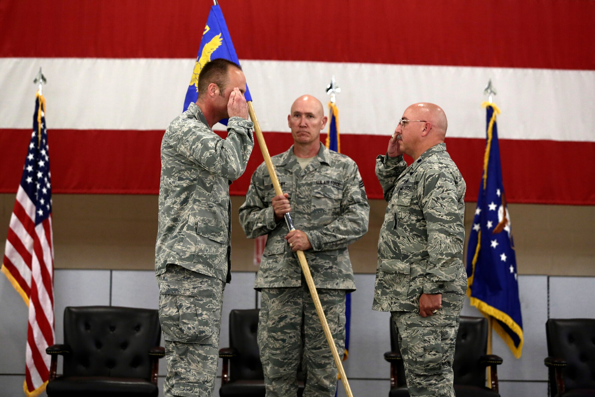 Lt. Col. John Easley, right, assumed command of the newly activated 223rd Intelligence Support Squadron during a Conversion Day ceremony held at Ebbing Air National Guard Base, Fort Smith, Arkansas, June 7, 2014. The 188th Fighter Wing was redesignated as the 188th Wing during the event. The ceremony also recognized the many changes occurring at the wing as a result of its conversion to a remotely piloted aircraft (MQ-9 Reapers) and intelligence, surveillance and reconnaissance mission. (U.S. Air National Guard photo by Master Sgt. Mark Moore)
