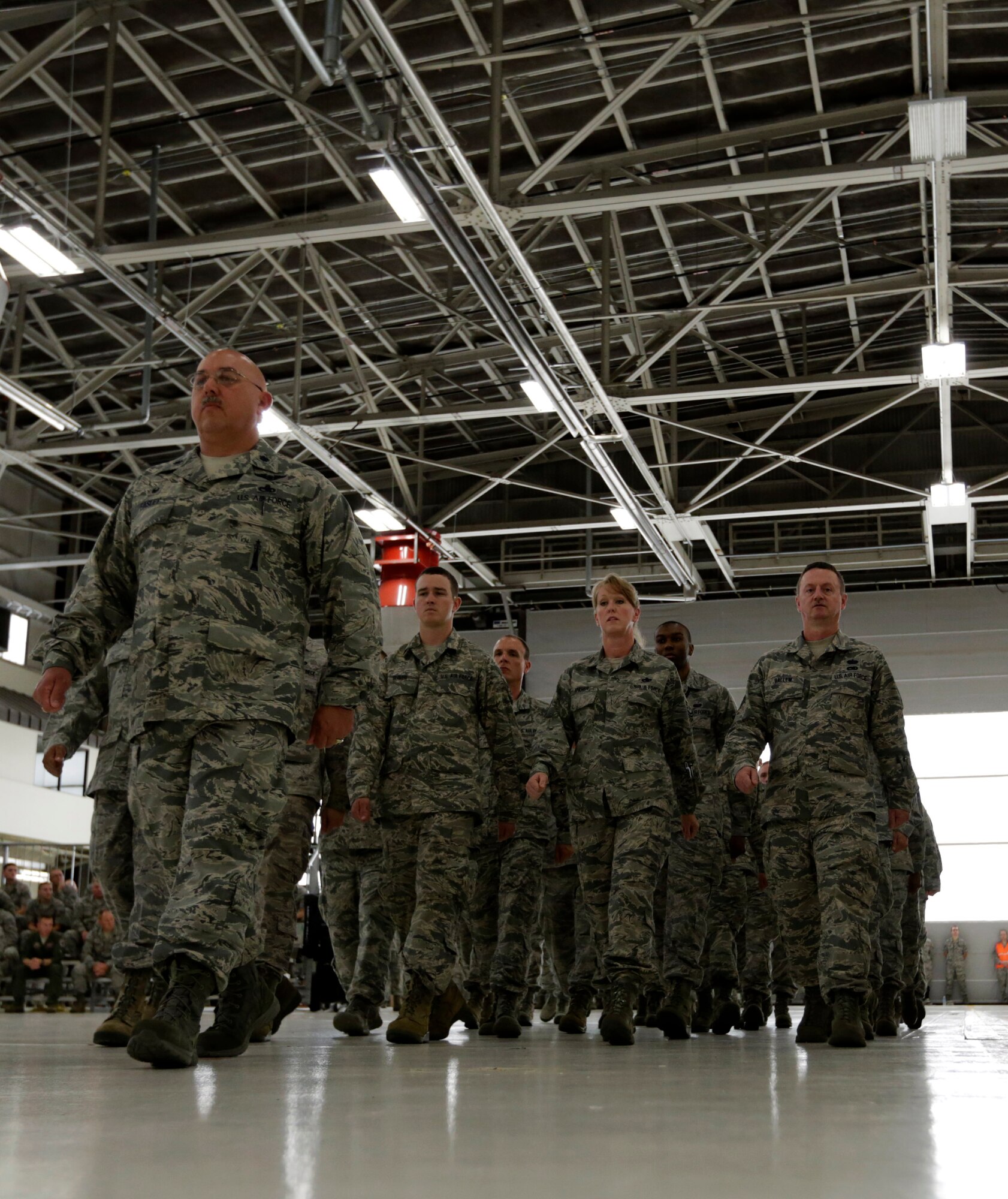 Lt. Col. John Easley calls out for his squadron to halt during a Conversion Day ceremony held at Ebbing Air National Guard Base, Fort Smith, Arkansas, June 7, 2014. The 188th Fighter Wing was redesignated as the 188th Wing during the event. The ceremony also recognized the many changes occurring at the wing as a result of its conversion to a remotely piloted aircraft (MQ-9 Reapers) and intelligence, surveillance and reconnaissance mission. Easley took command of the newly activated 223rd Intelligence Support Squadron during the ceremony. (U.S. Air National Guard photo by Master Sgt. Mark Moore)