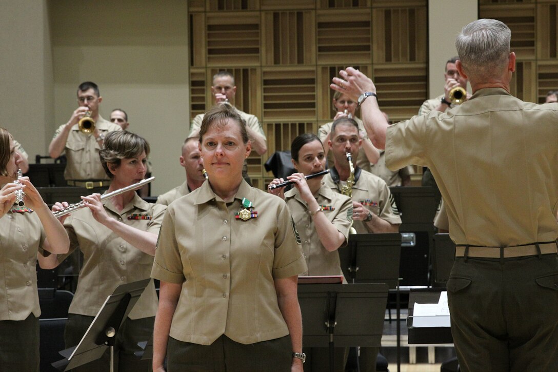 On May 23, 2014 saxophonist Master Sgt. Audrey Cupples retired from the Marine Band in a ceremony at the John Philip Sousa Band Hall at the Marine Barracks Annex in Washington, D.C. She served for 26 years. (U.S. Marine Corps photo by Master Sgt. Kristin duBois/released)