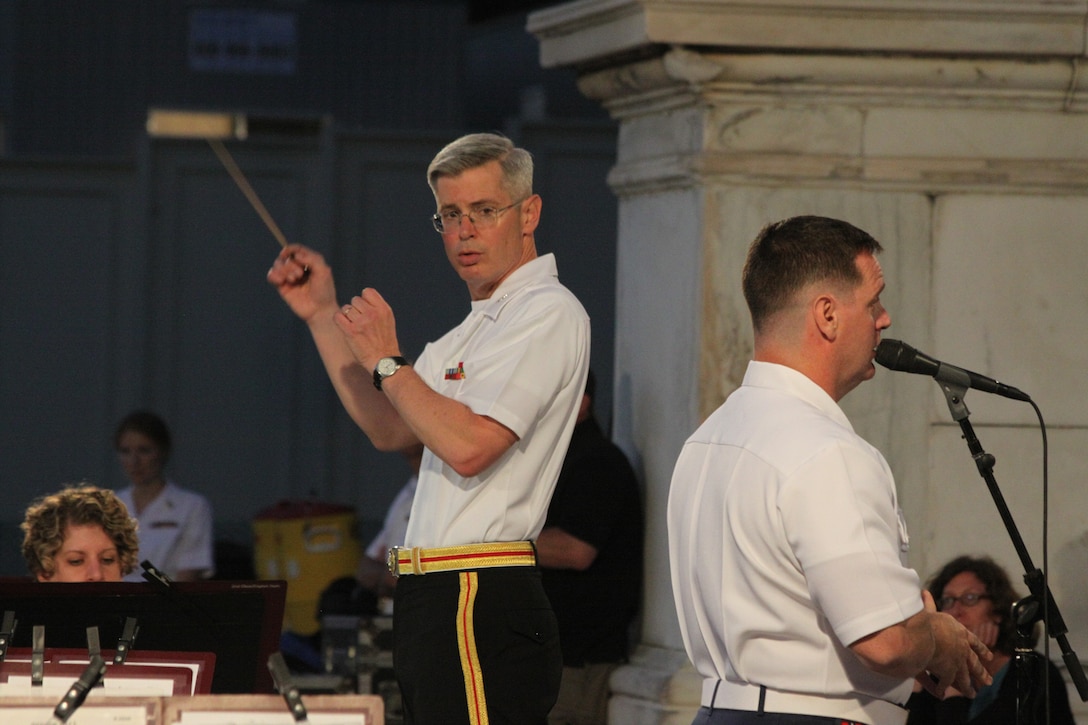 On June 5, 2014, Col. Michael J. Colburn conducted his last Marine Band concert as Director on the West Terrace of the U.S. Capitol in Washington, D.C. Bariton vocalist Master Sgt. Kevin Bennear sang Irish Songs, an arrangement by former chief arranger Master Sgt. Stephen Bulla, USMC (Ret.) (U.S. Marine Corps photo by Master Sgt. Kristin duBois/released)