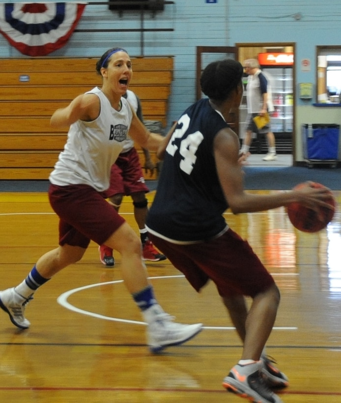 Team captain, Army Capt. Caitlin Chiaramonte, judge advocate for the 18th Fires Brigade, 82nd Airborne Division, Fort Bragg, N.C., plays defense during practice June 9 on Fort Indiantown Gap, Pa. Three members of this year’s Women’s Armed Forces Basketball team are stationed at Fort Bragg. (U.S. Army National Guard photo by Maj. Angela King-Sweigart/Released)