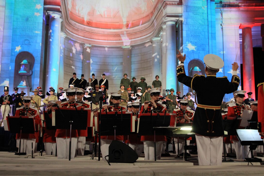 On June 15, 2014, Col. Michael Colburn led the Marine Band during Arlington National Cemetery's 150th Anniversary Celebration at the Memorial Amphitheater. (U.S. Marine Corps photo by Master Sgt. Kristin duBois/released)