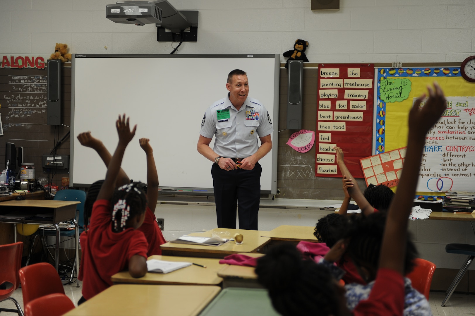 Master Sgt. Philip Skopp answers questions in a fifth-grade classroom at Malcolm X Elementary School during Career Day. 