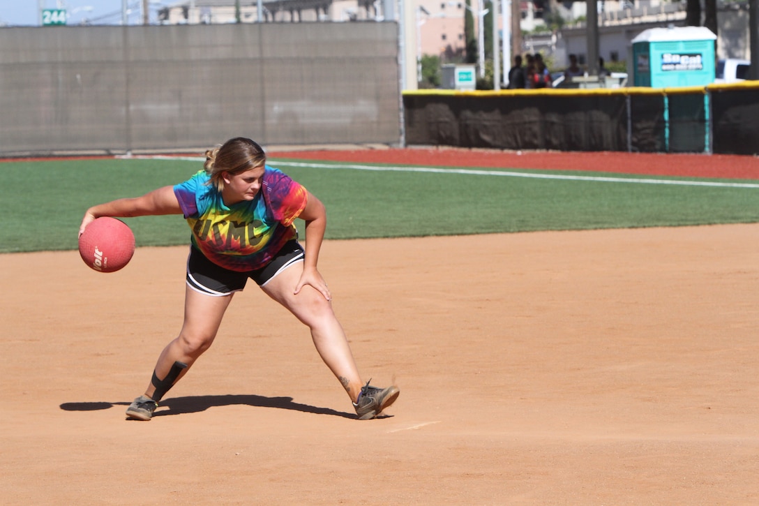 Linda Gonzalez, a Marine spouse with Marine Heavy Helicopter Squadron (HMH) 364 and an Austin, Texas native, pitches during a kickball tournament aboard Marine Corps Air Station Miramar, Calif., June 14. The tournament was part of the Committed and Engaged Spouses’ Sports League. The Committed and Engaged Spouse initiative, started by 3rd Marine Aircraft Wing Commanding General Maj. Gen. Steven Busby, highlights the service and sacrifice of military spouses, and works to develop opportunities to engage the community in camaraderie.