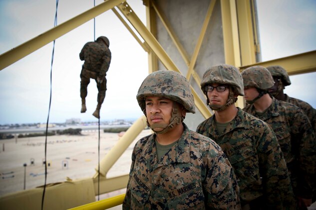 Recruit David AlvarezSanchez, Platoon 3274, Lima Company, 3rd Recruit Training Battalion, a native of Las Vegas, Nev., waits for his turn during a rappelling exercise at Marine Corps Recruit Depot San Diego, June 6.  Prior to the training, recruits were given a class on the proper techniques needed for rappelling.