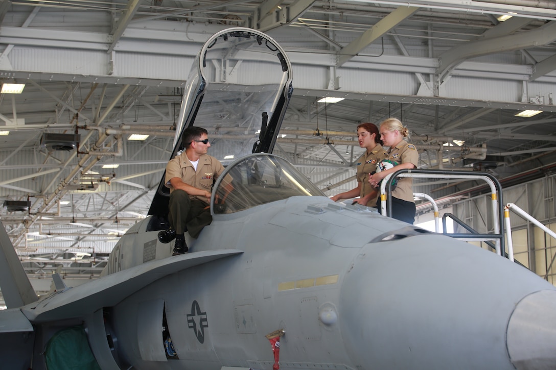 Navy JROTC cadets from Conway, Carolina Forest and North Myrtle Beach High Schools tour Marine Corps Air Station Beaufort, South Carolina in an effort to understand more about Marine Corps operations and supporting units, June 13, 2014. During the tour the cadets visited the Air Station's Aircraft Rescue and Firefighting station and Marine Fighter Attack Squadron 115. 