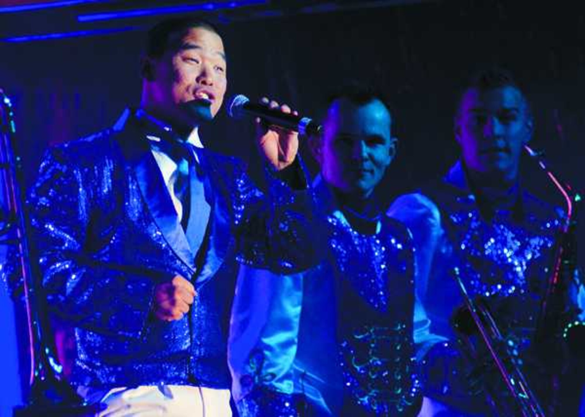 Staff Sgt. Mark Lindquist croons for a Joint Base Lewis-McChord audience during the Tops in Blue show, Nov. 8. Lindquist, a member of the Tops in Blue cast, is stationed with the 324th Intelligence Squadron at Joint Base Pearl Harbor-Hickam, Hawaii. (Northwest Guardian photo by David Poe)