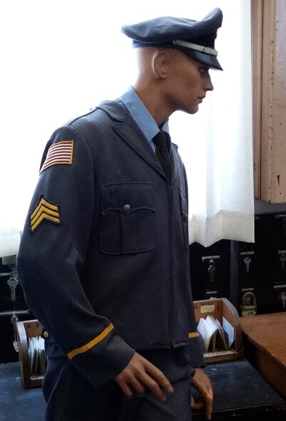 A mannequin dressed as a prison guard stands in a security cage at the entrance to the old state prison’s administrative building. The prison, located in Deer Lodge, Mont., closed in 1979 and is now operated as a museum by the Powell County Historical Society. (U.S. Air Force photo / John Turner)
