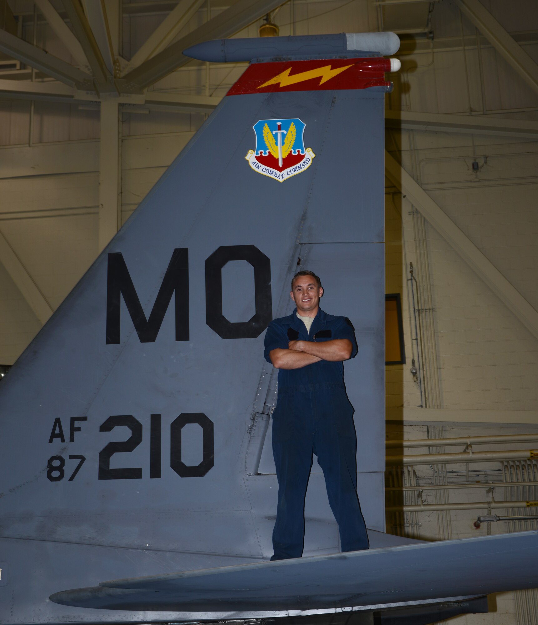 Senior Airman Wes Atkins, 366th Equipment Maintenance Squadron crew chief, stands on a F-15E Strike Eagle June 6, 2014, at Mountain Home Air Force Base, Idaho. Atkins assisted Idaho state police with a major accident and attruibutes his quick thinking to the risk-management training members receive during the 101 Critical Days of Summer. He urges everyone to be safe when driving on the interstate. (U.S. Air Force photo by Senior Airman Benjamin Sutton/Released)