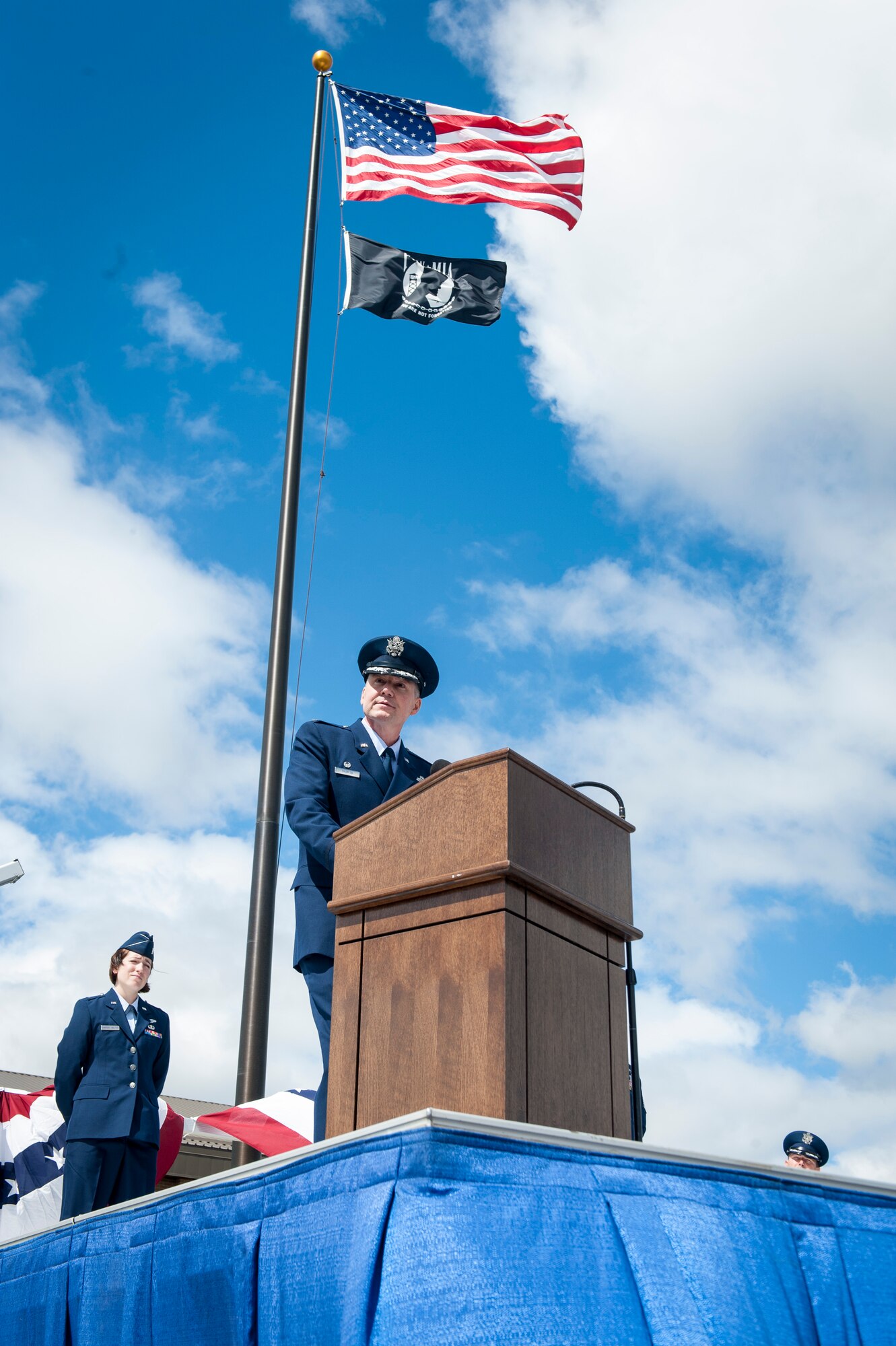 Col. William “Bill” Thomas thanks his Airmen and all in attendance at Team Fairchild before handing over the reins during the 336th Training Group’s change of command ceremony at Fairchild Air Force Base, Wash., June 16, 2014. Thomas handed over command of the group to Col. Jonathan Duncan. Duncan comes to Fairchild from an assignment at Hurlburt Field, Fla., where he served as the Chief, Programs Division, Headquarters Air Force Special Operations. The 336th TRG is the sole manager of all U.S. Air Force Survival, Evasion, Resistance and Escape training. Its mission is to provide at risk of isolation personnel with the skills and confidence to “Return with Honor.” (U.S. Air Force photo by Staff Sgt. Benjamin W. Stratton/Released)