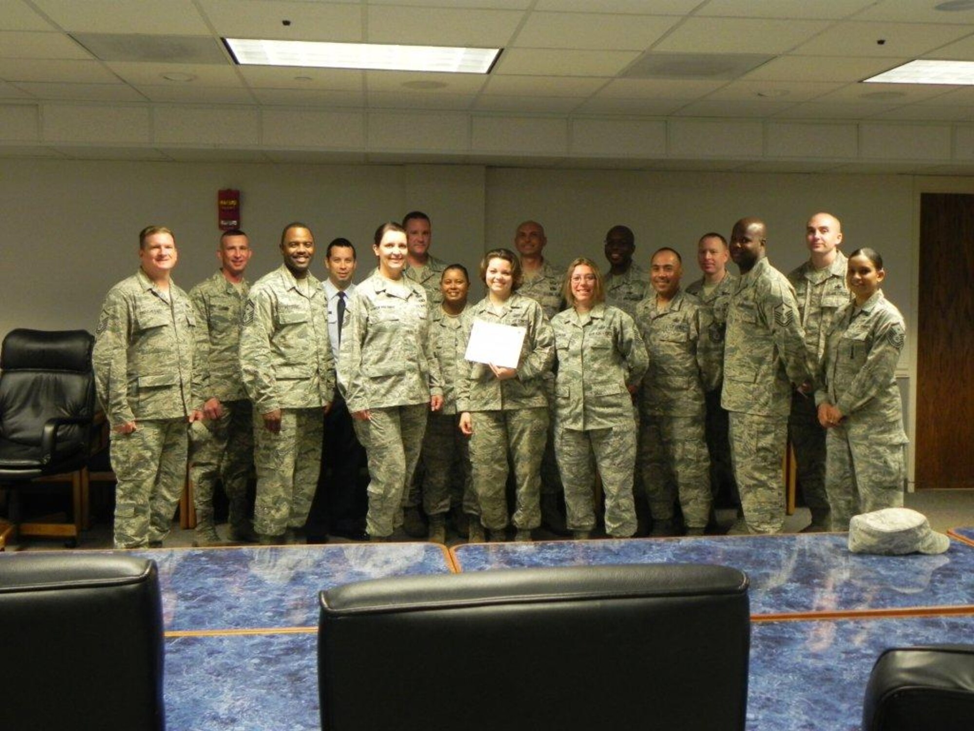 U.S. Air Force Senior Airman Marcella Hengehold, Ninth Air Force sharepoint administrator, is recognized by members of the Shaw First Sergeants Council as "Diamond Sharp." Diamond Sharp, the First Sergeant Council’s newly adopted program, aims to recognize two Airmen from across Shaw Air Force base monthly. (Courtesy photo)
