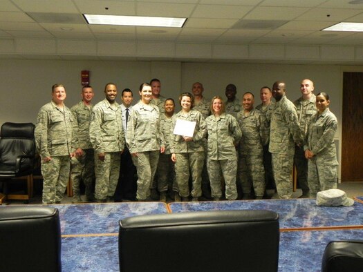 U.S. Air Force Senior Airman Marcella Hengehold, Ninth Air Force sharepoint administrator, is recognized by members of the Shaw First Sergeants Council as "Diamond Sharp." Diamond Sharp, the First Sergeant Council’s newly adopted program, aims to recognize two Airmen from across Shaw Air Force base monthly. (Courtesy photo)
