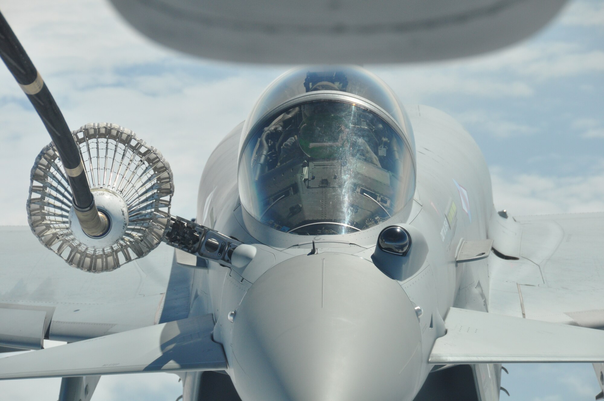 Royal Air Force pilots from the 6 Squadron flying the Eurofighter Typhoon get a rare opportunity to refuel from a KC-10 Extender piloted by Air Force Reserve aircrew stationed at Joint Base McGuire-Dix-Lakehurst, N.J, June 6, along a track near RAF Leuchars, United Kingdom. The training event took place on the 70th Anniversary of the allied invasion of Normandy, France during World War II.    (U.S. Air Force photo/Master Sgt. Donna T. Jeffries)