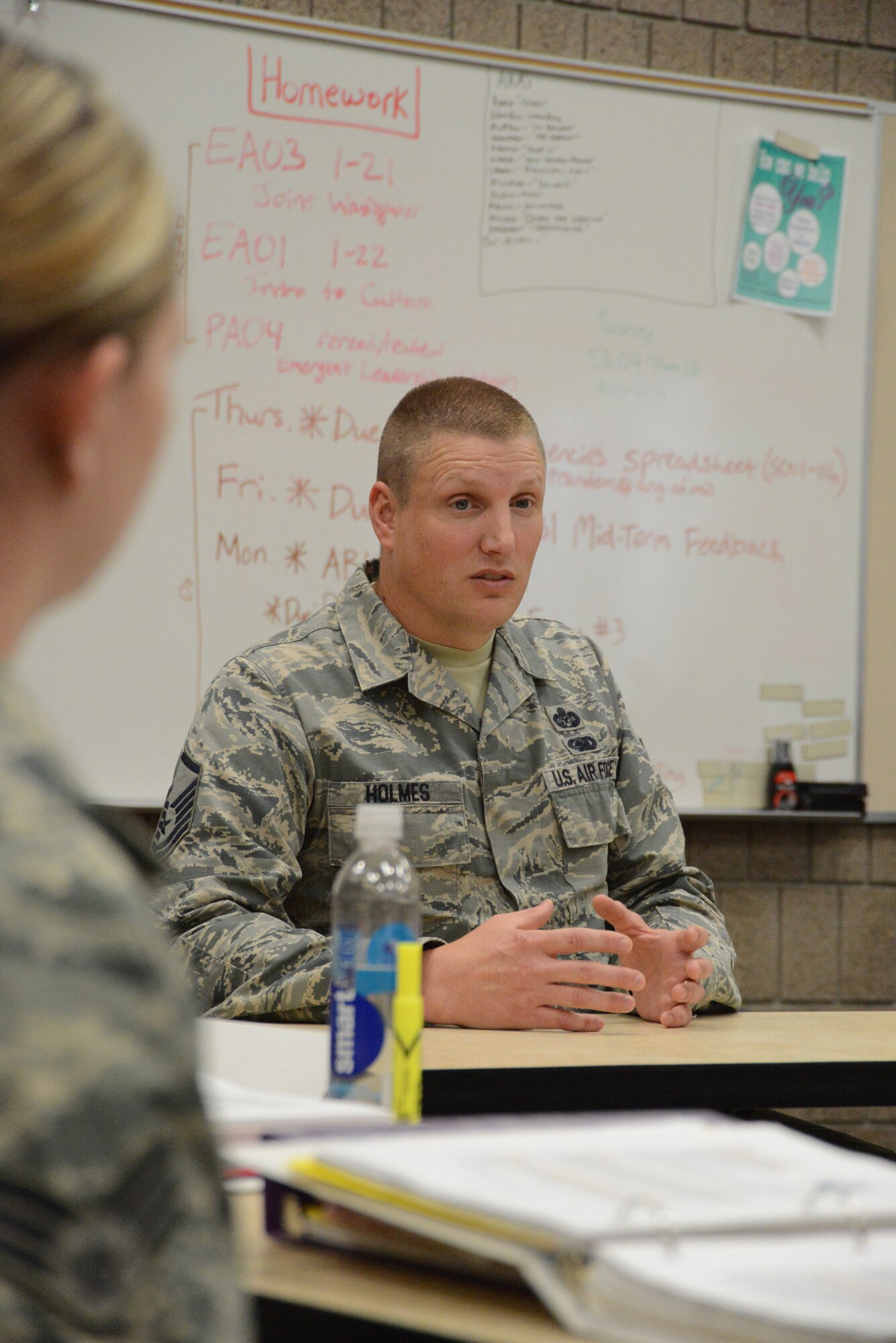 Master Sgt. Aaron Holmes, the Etchberger Airman Leadership School (ALS) commandant at the Grand Forks Air Force Base, N.D., speaks to ALS students during a class at the North Dakota Air National Guard Base, Fargo, N.D., June 12, 2014. The five-week ALS course is among the first in the country being offered by active duty instructors at an Air National Guard base. Instructors traveling to students’ location are a cost effective way of conducting training. (U.S. Air National Guard photo by SMSgt. David H. Lipp/Released)