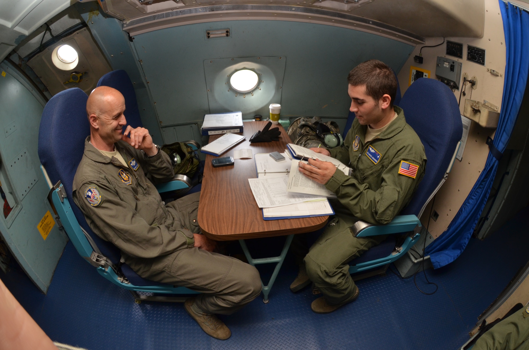 MSgt. Christopher Hellyar trains SrA. Michael Buchanan, both 337th Airlift Squadron Loadmasters, on proper procedures just before the C-5 Galaxy aircraft departs Westover for a three day humantiarian aid mission to Nicaragua, June 9, 2014. (U.S. Air Force photo/SSgt. Kelly Goonan)