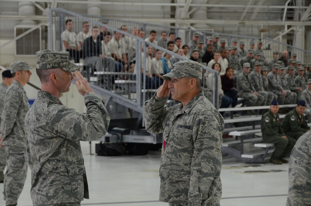 Maj. Philip Stratton, the 126th Logistics Readiness Squadron commander, salutes Col. Richard Nyalka, the 126th Mission Support Group commander, during Col. Naylka’s final inspection at Scott Air Force Base, Ill., May 3, 2014. Nyalka was the Mission Support Group commander for 15 years. (Air National Guard photo by Senior Airman Elise Stout)
