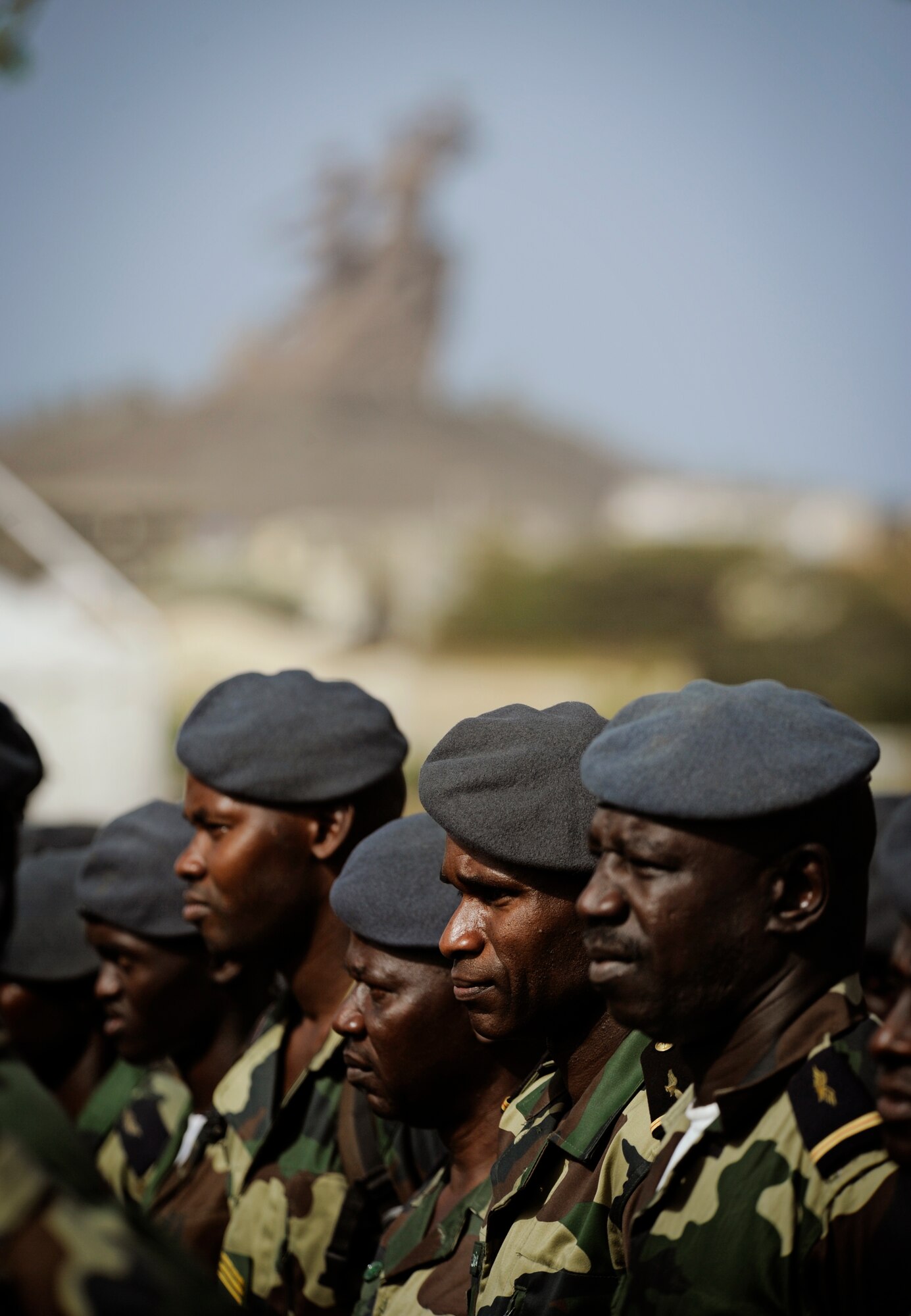 Airmen from the Ghanaian Air Force stand in formation during an opening ceremony for the U.S. Air Forces in Europe and Air Forces Africa lead Partnership Flight in Dakar, Senegal, June 16, 2014. USAFE-AFAFRICA Airmen are in Senegal for APF, a program designed to improve communication and interoperabilty between regional partners in Africa. The African partners include Senegal, Togo, Burkina Faso, Benin, Ghana, Mauritania, Nigeria and Niger with the U.S. helping with organization. (U.S. Air Force photo/ Staff Sgt. Ryan Crane)