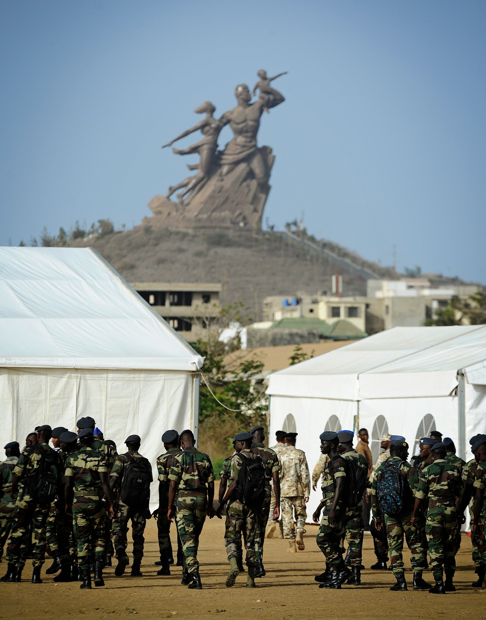 Airmen from multiple African countries head to their classrooms during the U.S. Air Forces in Europe and Air Forces Africa lead African Partnership Flight in Dakar, Senegal, June 16, 2014. USAFE-AFAFRICA Airmen are in Senegal for APF, a program designed to improve communication and interoperabilty between regional partners in Africa. The African partners include Senegal, Togo, Burkina Faso, Benin, Ghana, Mauritania, Nigeria and Niger with the U.S. helping with organization. (U.S. Air Force photo/ Staff Sgt. Ryan Crane)