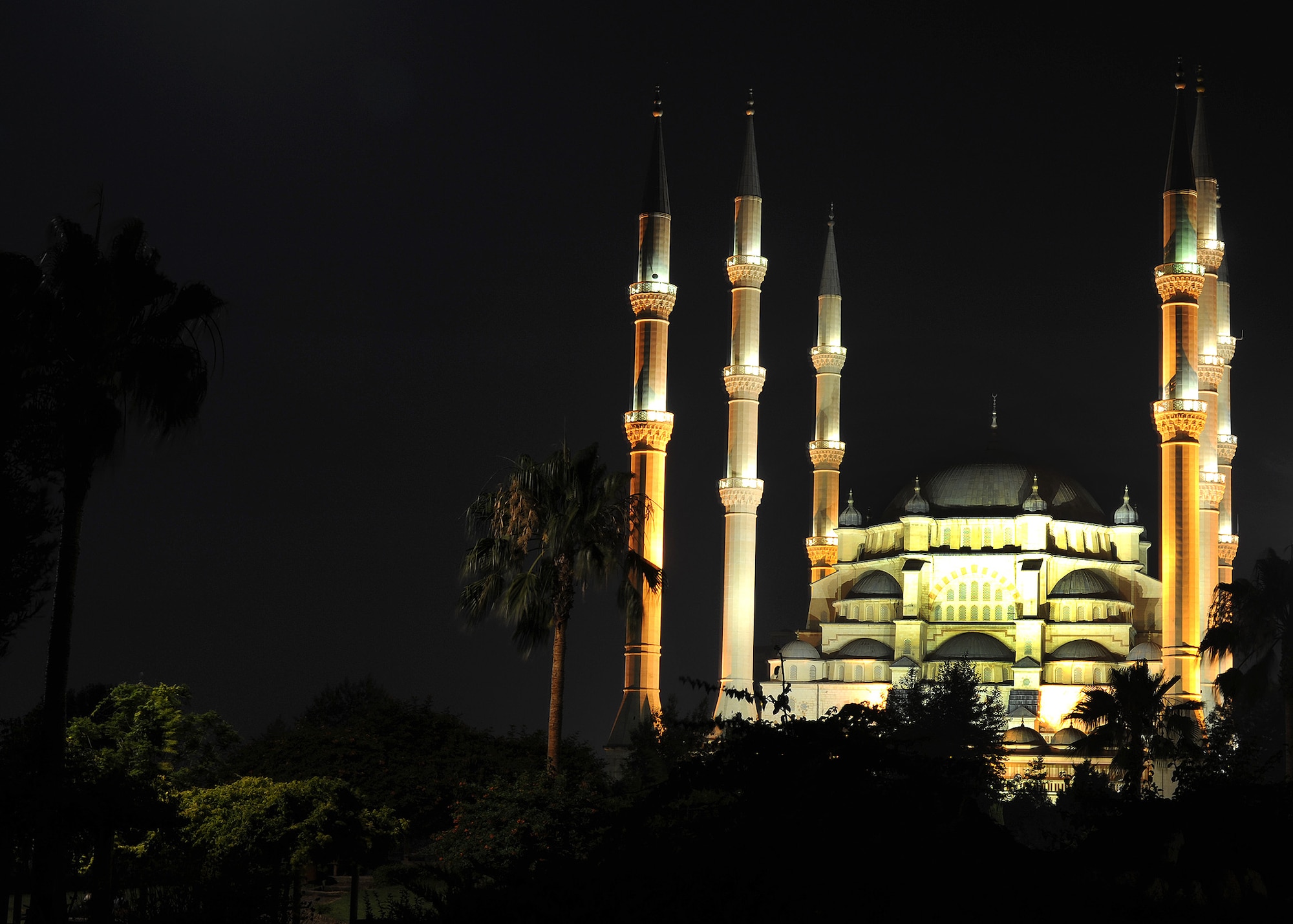 The Sabanci Mosque is illuminated during the celebration called Kandil held June 12, 2014, Adana, Turkey. There are five holy evenings on the Muslim calendar which are called Kandil. During the Ottoman Empire, Sultan Selim II, of 16th, century lit candles on the minarets (towers) of the mosques in order to announce these holy nights to the public. (U.S. Air Force photo by Staff Sgt. Veronica Pierce) 