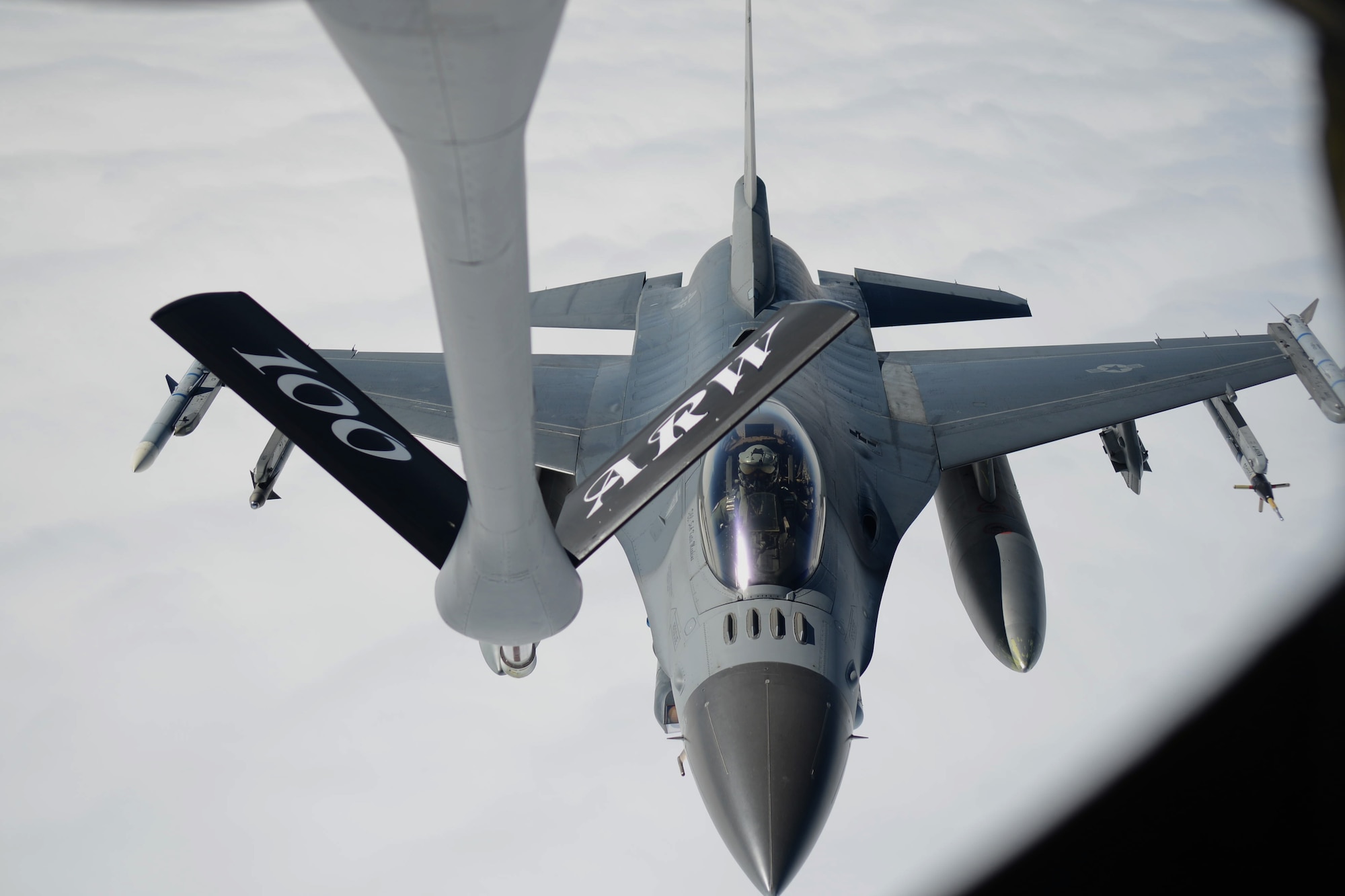 A U.S. Air Force F-16 Fighting Falcon flies towards the boom pod of a KC-135 Stratotanker assigned to the 351st Expeditionary Air Refueling Squadron-Poland June 13, 2014, during a Baltic Operations Exercise mission over Germany. The BALTOPS Exercise provides the opportunity for personnel of participating nations to engage in realistic training to build experience, teamwork and strengthen interoperability while working toward mutual goals. (U.S. Air Force photo/Airman 1st Class Kyla Gifford/Released)