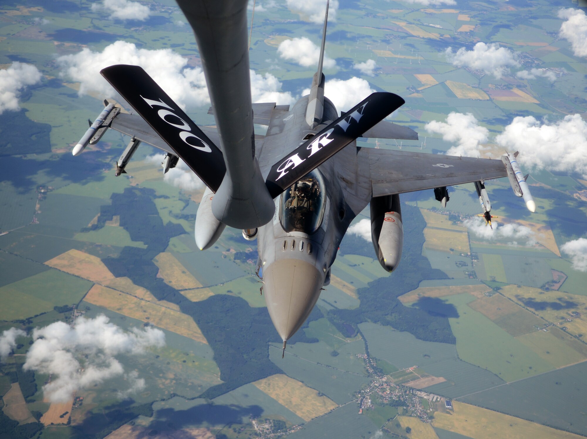 A U.S. Air Force F-16 C/D Fighting Falcon prepares to take on fuel from a KC-135 Stratotanker assigned to the 100th Air Refueling Wing during the Baltic Operations Exercise June 12, 2014, over Germany. The BALTOPS Exercise provides the opportunity for personnel of participating nations to engage in realistic training to build experience, teamwork and strengthen interoperability while working toward mutual goals. (U.S. Air Force photo/Airman 1st Class Dillon Johnston/Released)