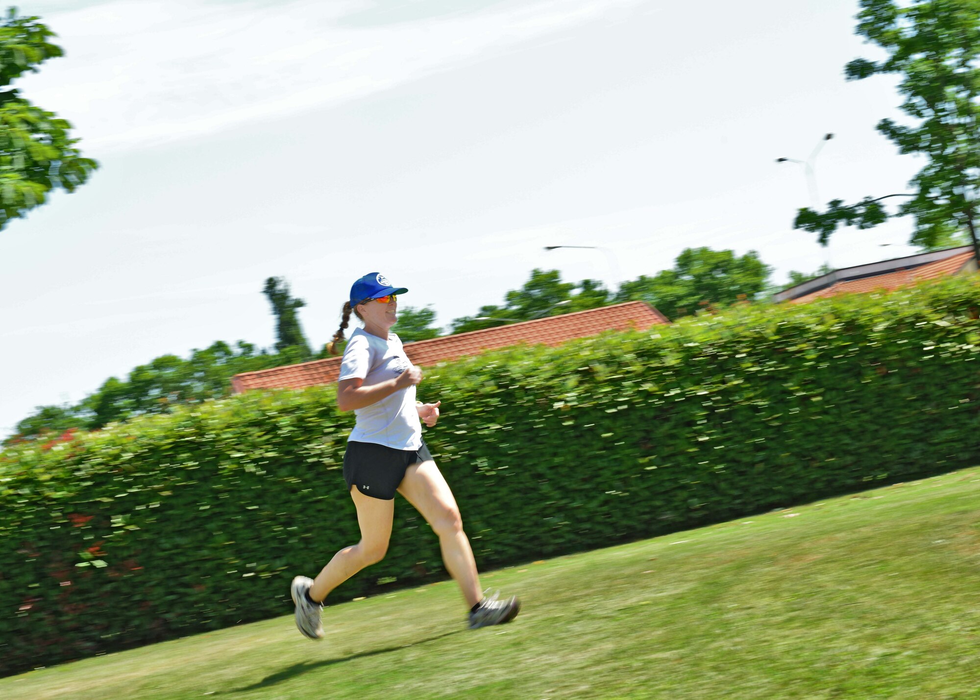 A runner completes the “Friday the 13th Fun Run,” June 13, 2014, at Aviano Air Base, which was a part of the Defense Commissary Agency’s Healthy Lifestyle Festival. With the theme “Shop Healthy! Eat Healthy! Be Healthy!” DeCA’s Lifestyle Festival reinforces the health and wellness goals of the military community. (U.S. Air Force photo/Airman 1st Class Ryan Conroy) 