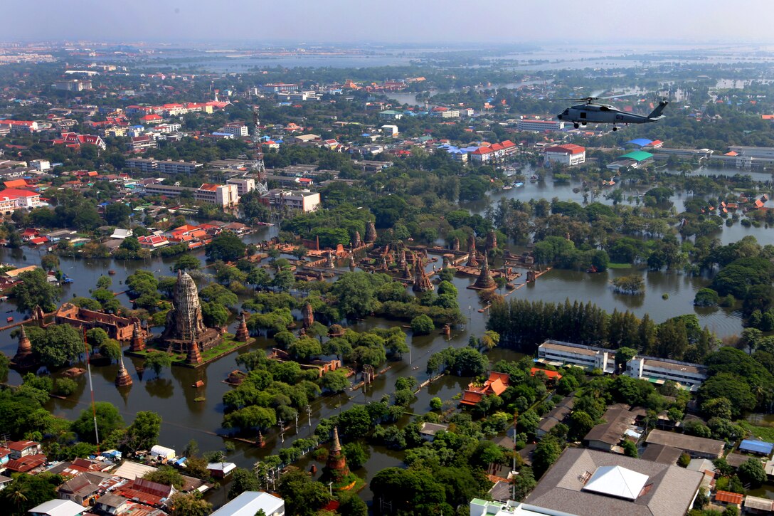 A U.S. Navy SH-60F Seahawk helicopter carrying U.S. Ambassador to Thailand Kristie A. Kenney conducts an aerial survey of flooded areas around Bangkok, Thailand, Oct. 24, 2011. U.S. Marines assigned to the 3rd Marine Expeditionary Force's humanitarian assistance team surveyed the damage to determine what help U.S. forces could provide to support the Thai armed forces.  
