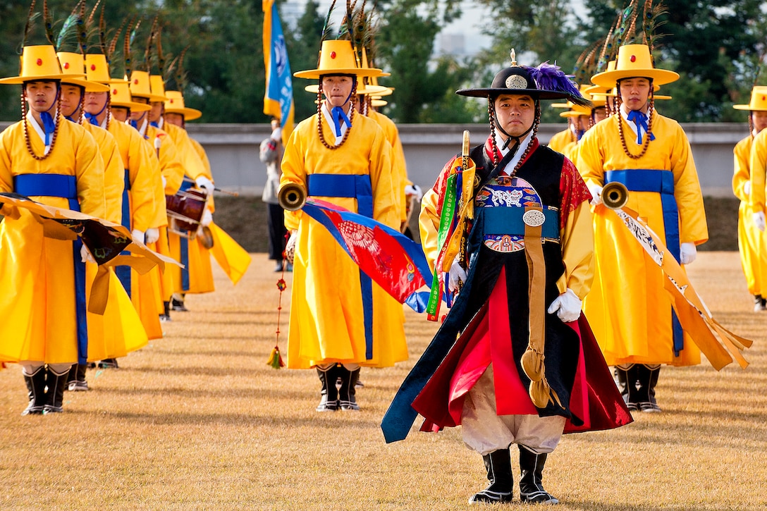 A South Korean honor guard stands at attention before conducting a pass-in-review ceremony in Seoul, South Korea, Oct. 27, 2011.  
