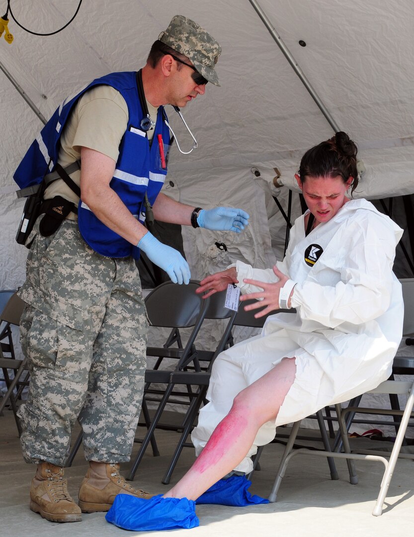 Army Lt. Col. Dan A. Manning, a physician's assistant with the Kentucky National Guard's Chemical, Biological, Radiological, Nuclear High-Yield Explosives Enhanced Response Force Package training and a mission certification at Muscatatack Urban Training Center, Butlerville, Ind., May 23, 2012. During the certification, evaluators said members of the Kentucky CERFP surpassed many previously-held training records and is among the best CERFP's in the country.