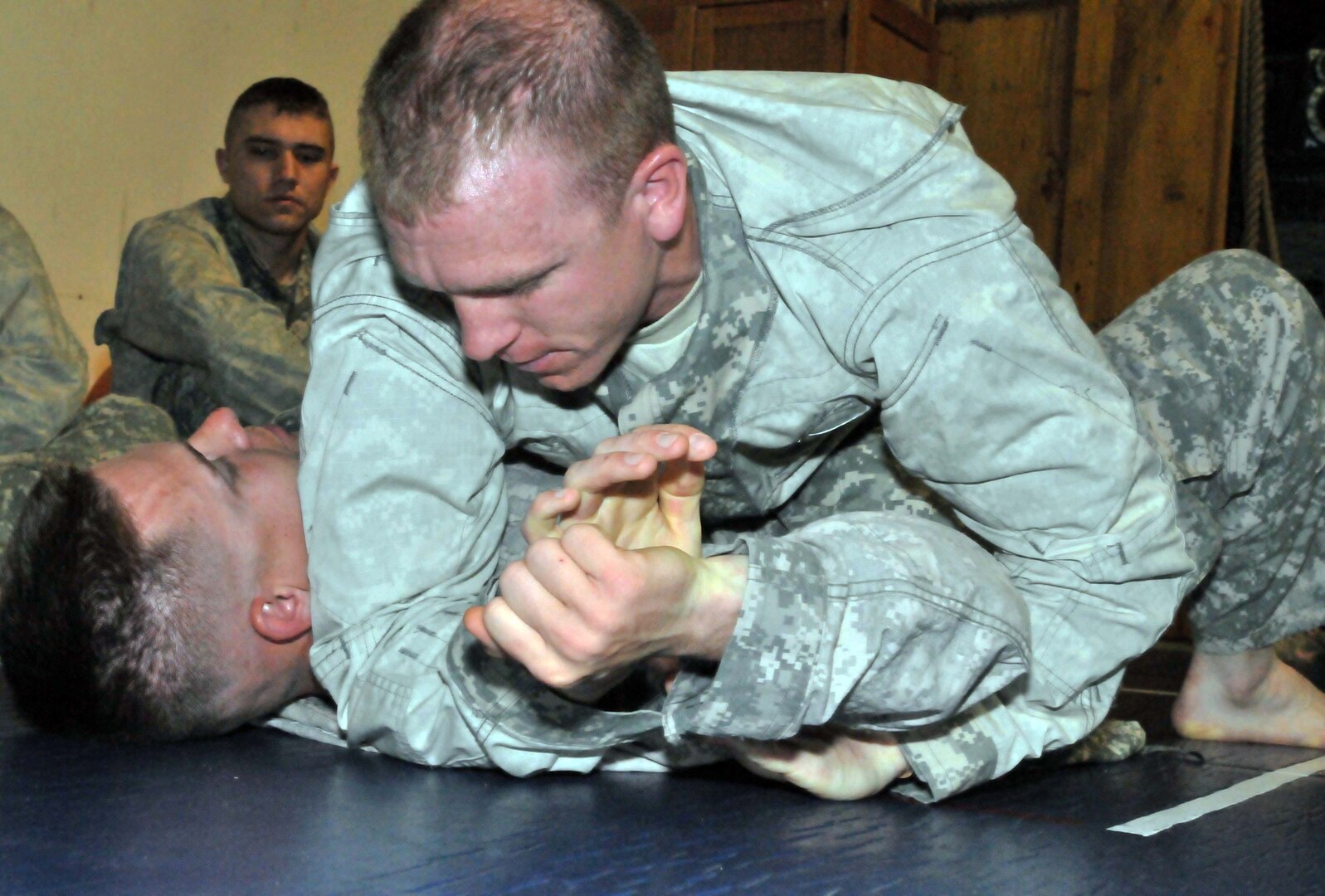 Soldiers assigned to Multinational Battle Group East participate in the basic combatives course at Camp Bondsteel, Kosovo May 11, 2012. The course, which began May 7 and was part of Modern Army Combatives, is the entry level program to prepare Soldiers to defeat the enemy in hand-to-hand combat.