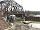 Construction of the cofferdam at Omega Pond as part of the Ten Mile River Ecosystem Restoration project, East Providence, R.I. Construction of the fish ladder at Omega Pond in ongoing and is expected to be complete in April of 2015.