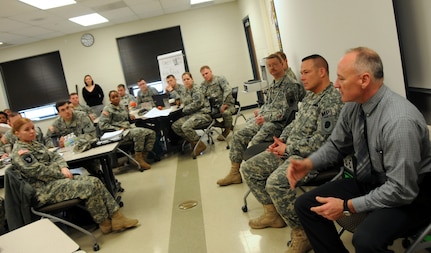 Detective Mark DeVaney, with the Springfield Police Department speaks to nearly 70 Soldiers with the Illinois National Guard attending the two week Sexual Harassment and Assault Response and Prevention training Feb. 23, 2012 at Camp Lincoln in Springfield, Ill. The Soldiers met with a panel of sexual assault response experts from the Springfield area.