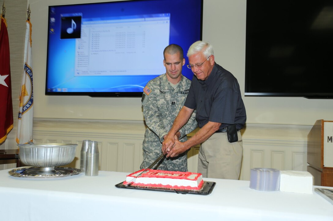 June 16, 2014 – In military tradition, Mississippi Valley Division employees, from the youngest to the oldest, celebrated the U.S. Army’s 239th birthday, which included a cake-cutting ceremony. Pictured are Cpt. Timothy R. Tracy, aide-de-camp, and Joe Lemons, director of the Regional Business Directorate, cutting the Army’s birthday cake. 

The Army continues to demonstrate its incredible competence, enduring commitment and extraordinary character in defense of our Nation. 
