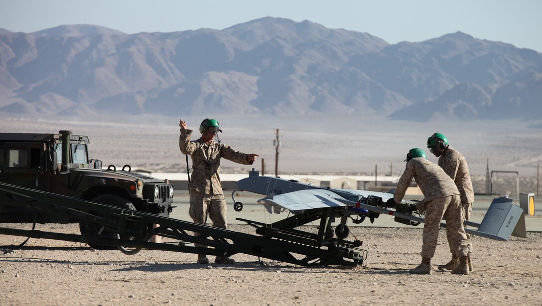 Marines with Marine Wing Unmanned Aerial Vehicle Squadron 4, Marine Aircraft Group 48, prepare an unmanned aerial vehicle for take off during Integrated Training Exercise 4-14 here June 13, 2014. The squadron flies the aircraft to provide surveillance, intelligence and target marking for ground element units during combat. ITX is a cornerstone of the Marine Air Ground Task Force training program.  It is the largest annual U.S. Marine Corps Reserve training exercise which helps refine skills necessary to seamlessly integrate with their active duty counterparts as well as operate as a complete MAGTF. 