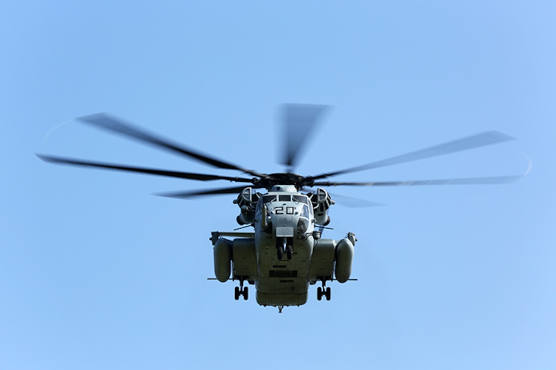 A CH-53E Super Stallion from Marine Medium Tiltrotor Squadron 365 (Reinforced), 24th Marine Expeditionary Unit, prepares to drop off 24th MEU Marines and Sailors with Battalion Landing Team 3rd Battalion, 6th Marine Regiment during a vertical assault raid course at Camp Lejeune, N.C., June 17, 2014. The assault was part of Lima Company, BLT 3/6’s pre-deployment training in preparation for the 24th MEU’s deployment at the end of the year. (U.S. Marine Corps photo by Cpl. Devin Nichols)
