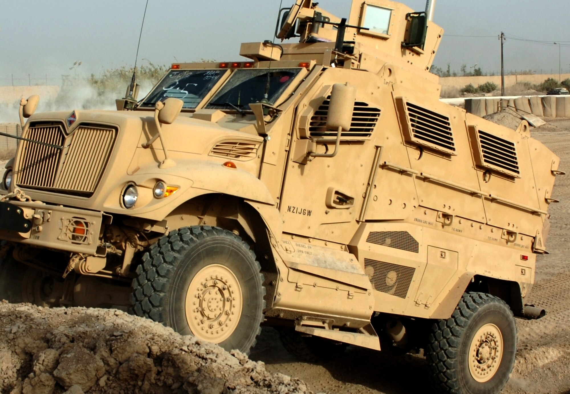 Soldiers from Company B, 1-30th Infantry Regiment, 2nd Brigade Combat Team, 3rd Infantry Division, drive a mine-resistant, ambush-protected vehicle, or MRAP, through an off-road confidence course at Camp Liberty, Iraq, Nov. 7, 2007. (U.S. Army Photo/Sgt. Michael Connors)