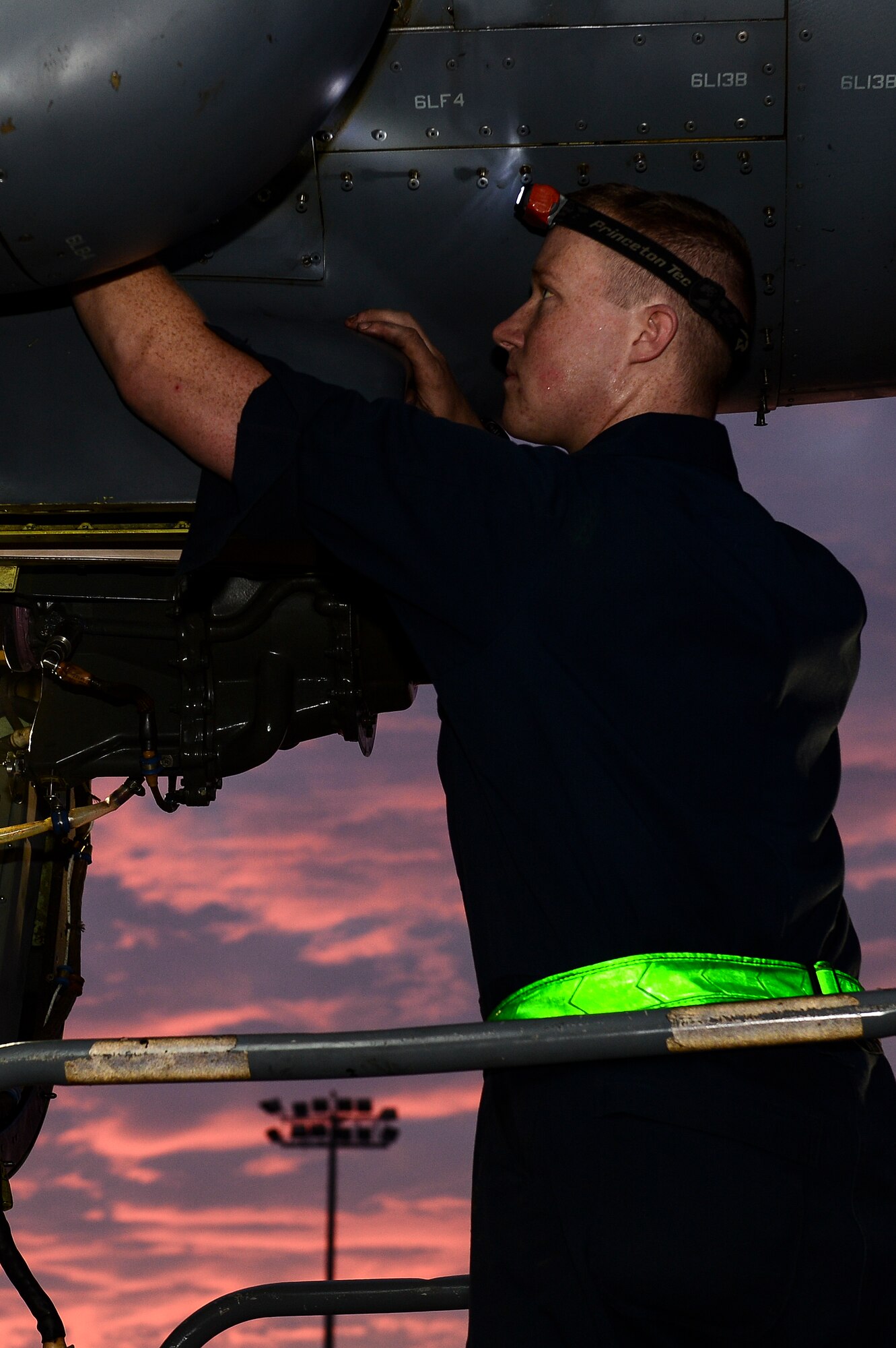 Airman 1st Class Chris Butler, 801st Special Operations Aircraft Maintenance Squadron dedicated crew chief, removes part of a CV-22 Osprey engine on Hurlburt Field, Fla., June 13, 2014. The 801st SOAMXS performs equipment maintenance in support of worldwide special operations missions. (U.S. Air Force photo/Airman 1st Class Jeff Parkinson)






